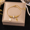 Gold-Tone Titanium Steel Charm Bracelet with Adjustable Chain