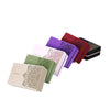 Collection of colorful printed and solid foam yoga blocks arranged in a row