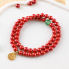 Cinnabar Bead Bracelet with Gold-Tone Fu Charm
