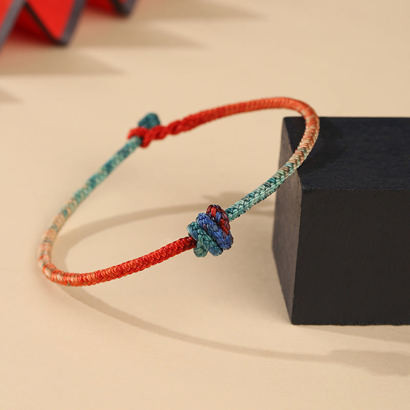 Hand-woven Red and Blue Knot Bracelet