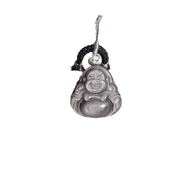 Close up of a carved silver sheen obsidian laughing Buddha pendant on a black twisted rope chain.