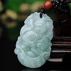 Pale green carved jade pendant featuring a Chinese zodiac animal design on a dark cord