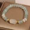 Blue Chalcedony Abacus Bead Bracelet with White Jade Charm