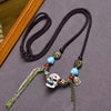 Skull Pendant Necklace with Turquoise Beads and Tassels