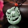 Green jade rabbit pendant carved on a crescent moon shape