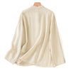 Back view of a beige long sleeve linen shirt on a hanger