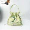 Embroidered Drawstring Bucket Bag with Tassel, Floral and Animal Motifs