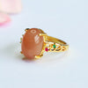 Adjustable Orange Moonstone Ring with Vine Detail