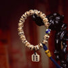 Carved Bone Bead Bracelet with Tassel Charm