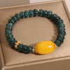 Blue water jade abacus bead bracelet with a yellow topaz center stone