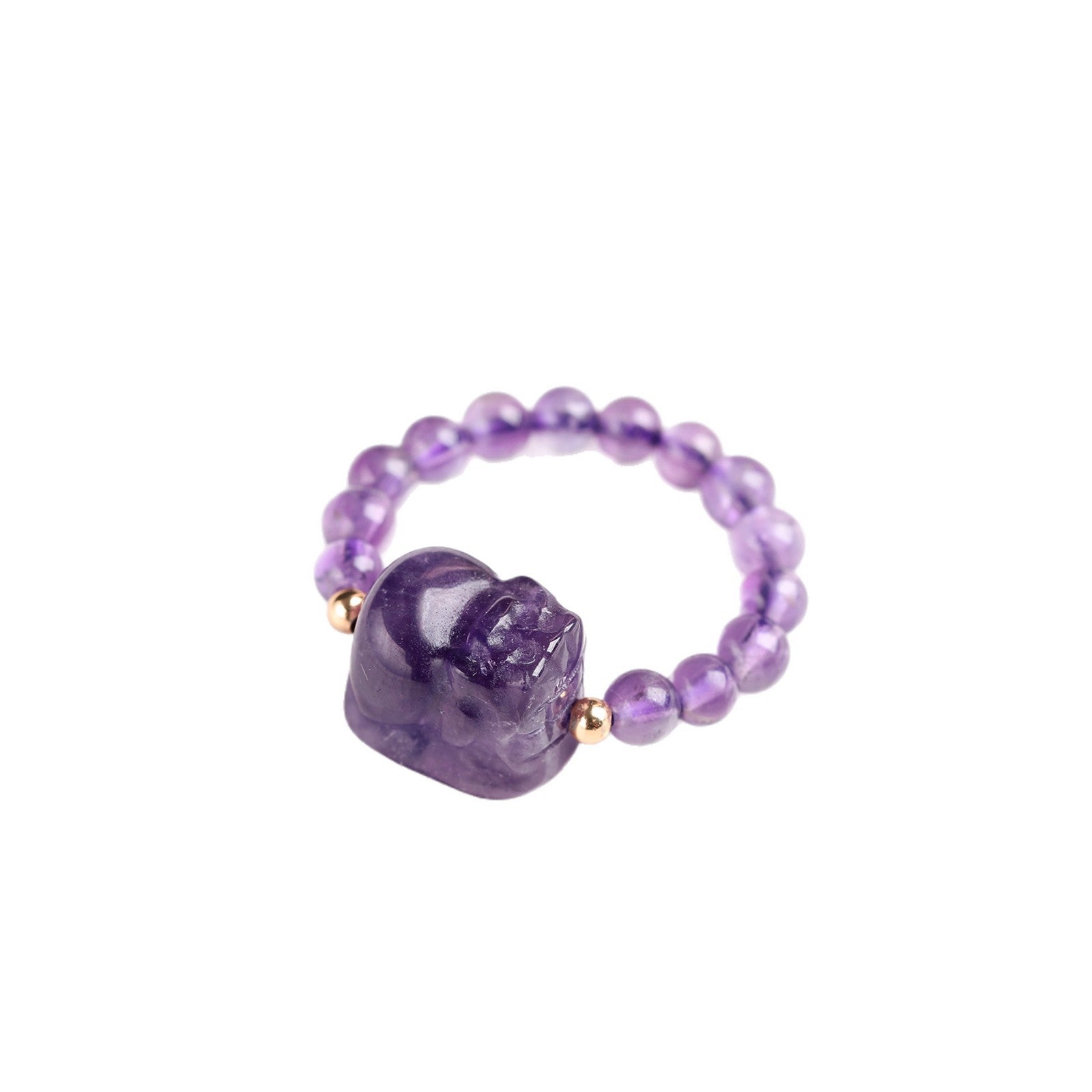 Close up of a purple amethyst beaded ring with a carved Pixiu charm