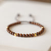 Adjustable Golden Silk Sandalwood Bracelet with Gold-tone Beads