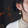 Bodhi Seed Cat Paw Earrings with Gold-Tone Hook