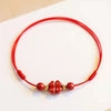 Cinnabar Flower Anklet, Red and Black Cord