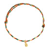 Multicolored woven cord bracelet with a small gold-tone rectangular charm on a white background