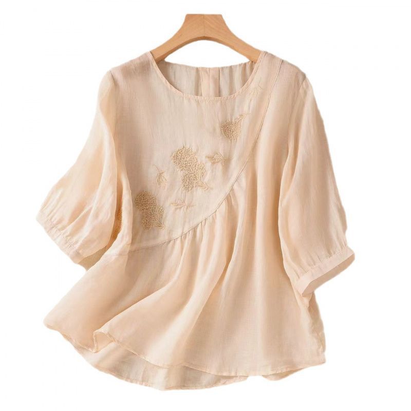 Beige embroidered flower crew neck women's half sleeve shirt on wooden hanger