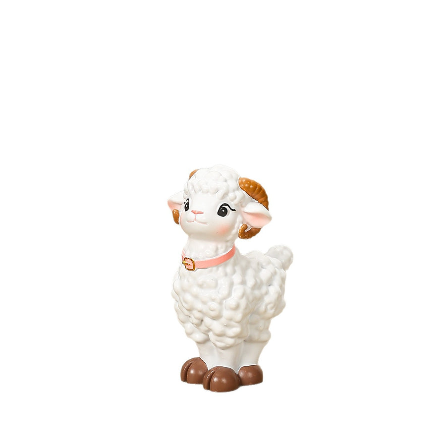 A small white resin sheep figurine with brown hooves and horns standing against a white background.