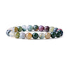 Close up view of a multi-colored agate bead bracelet on a white background