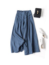 Navy blue cotton linen wide leg pants flat lay with white shoes