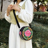 Embroidered Round Canvas Crossbody Bag with Floral Motifs