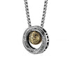 Close up of silver tone Mobius necklace with gold tone center bead