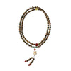 Multi-loop green sandalwood bracelet with a white cat charm and red accents