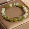 Green Jade Bead Bracelet with Gold-Tone Spacers