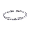 Silver tone rope cuff bracelet with Tibetan script engraving on wrist