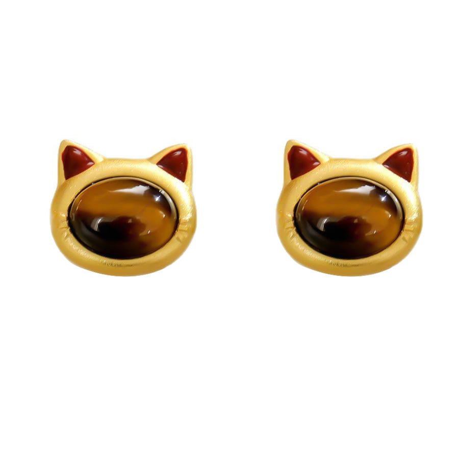 Pair of gold-tone cat head stud earrings with round tiger eye stones on a white background