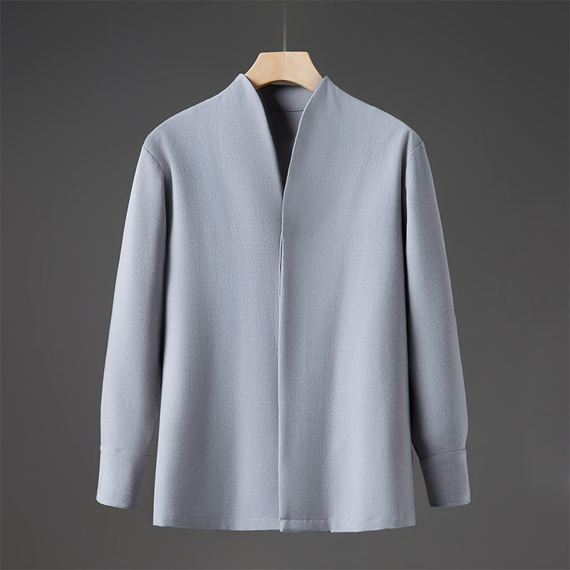Front view of a light blue men's long sleeve shirt with a stand collar on a hanger