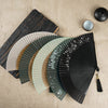 A collection of simple handheld folding fans with cherry flower designs in various colors