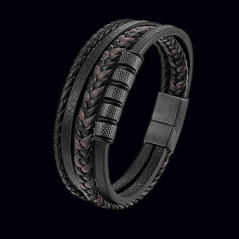 Close-up of a multi-layer braided leather bracelet with a magnetic clasp
