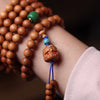 Sandalwood Mala Bracelet with Green Accent Beads