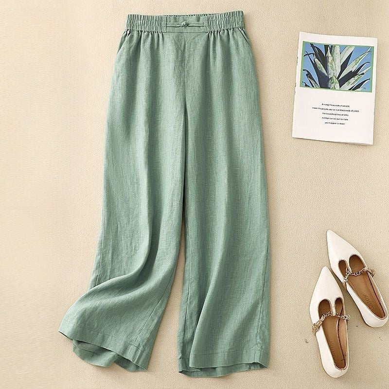 Light green wide leg cotton linen pants with elastic waist and frog button detail