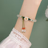 Interlocking Peace Buckle Bracelet, Faux Jade Beads