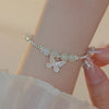 Silver-Plated Butterfly Charm Bracelet with Pale Beads