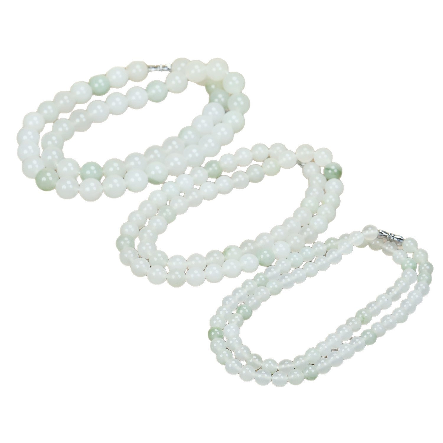 Coiled strand of white and light green Tianshan jade beads on a wooden surface
