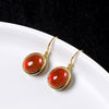 Red Agate Drop Earrings with Swastika and Dragon Motif