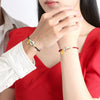 Cord Peace Buckle Bracelet with Fu Charm