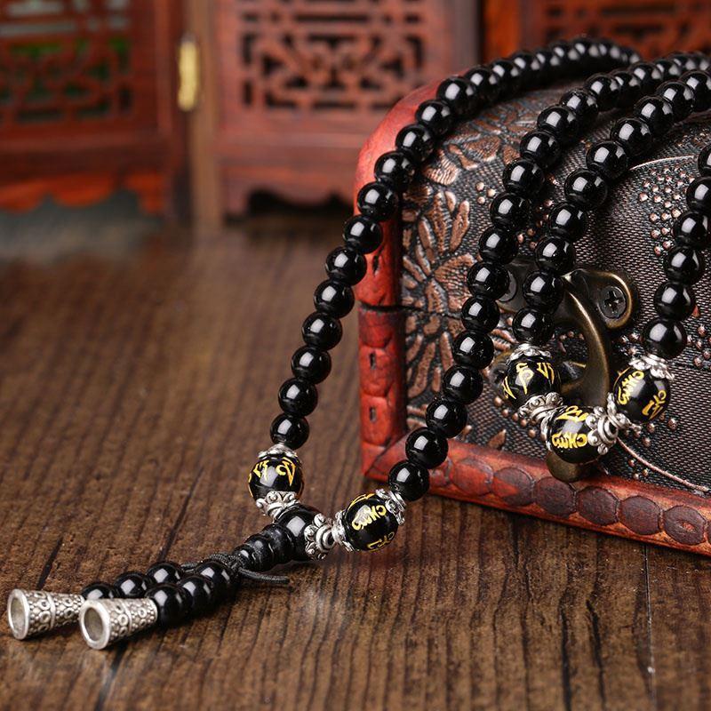 Black obsidian multi-wrap mala bracelet with six true words beads and tassel on wooden box