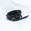 Black cowhide leather wrap bracelet with gold-tone circular buckle