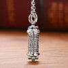 Silver tone copper cylinder pendant with engraved mantras and colorful stones