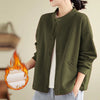 Model wearing a green long sleeve jacket with pockets
