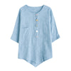 Light blue women's short sleeve shirt with frog buttons and a pocket