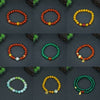 A grid showing nine variations of round agate bead bracelets in red, yellow, and green tones on a dark background.