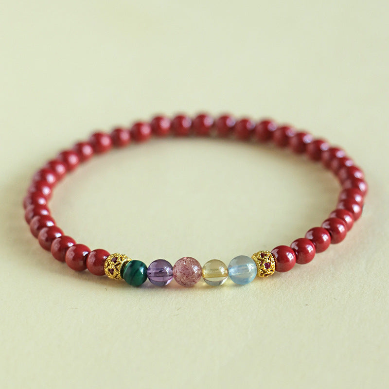 Red cinnabar beaded bracelet with five colorful natural gemstones and gold-tone spacers