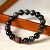 Rainbow Obsidian Bracelet with Carved Wood Mantra Bead