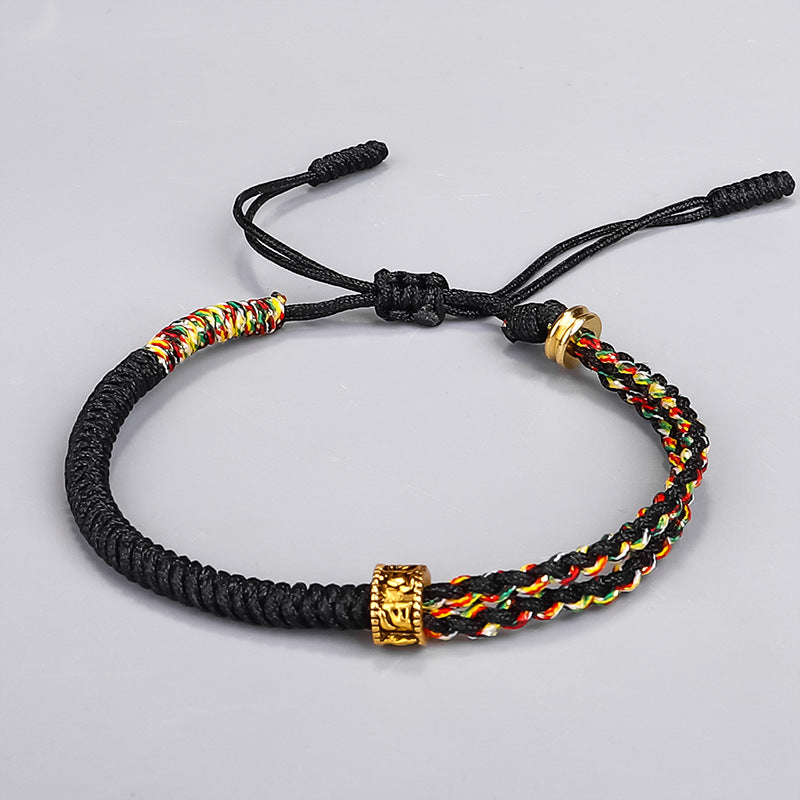 Black hand-woven cord bracelet with gold mantra bead