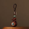 Wooden Money Bag Keychain with Rotatable Mantra Bead