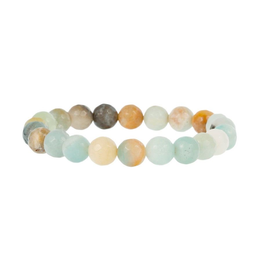 A stack of colorful round stone bracelets on a wrist